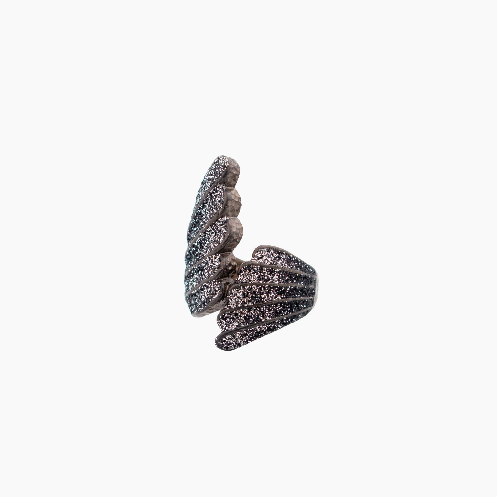 Decorative ring sculpture on a white background