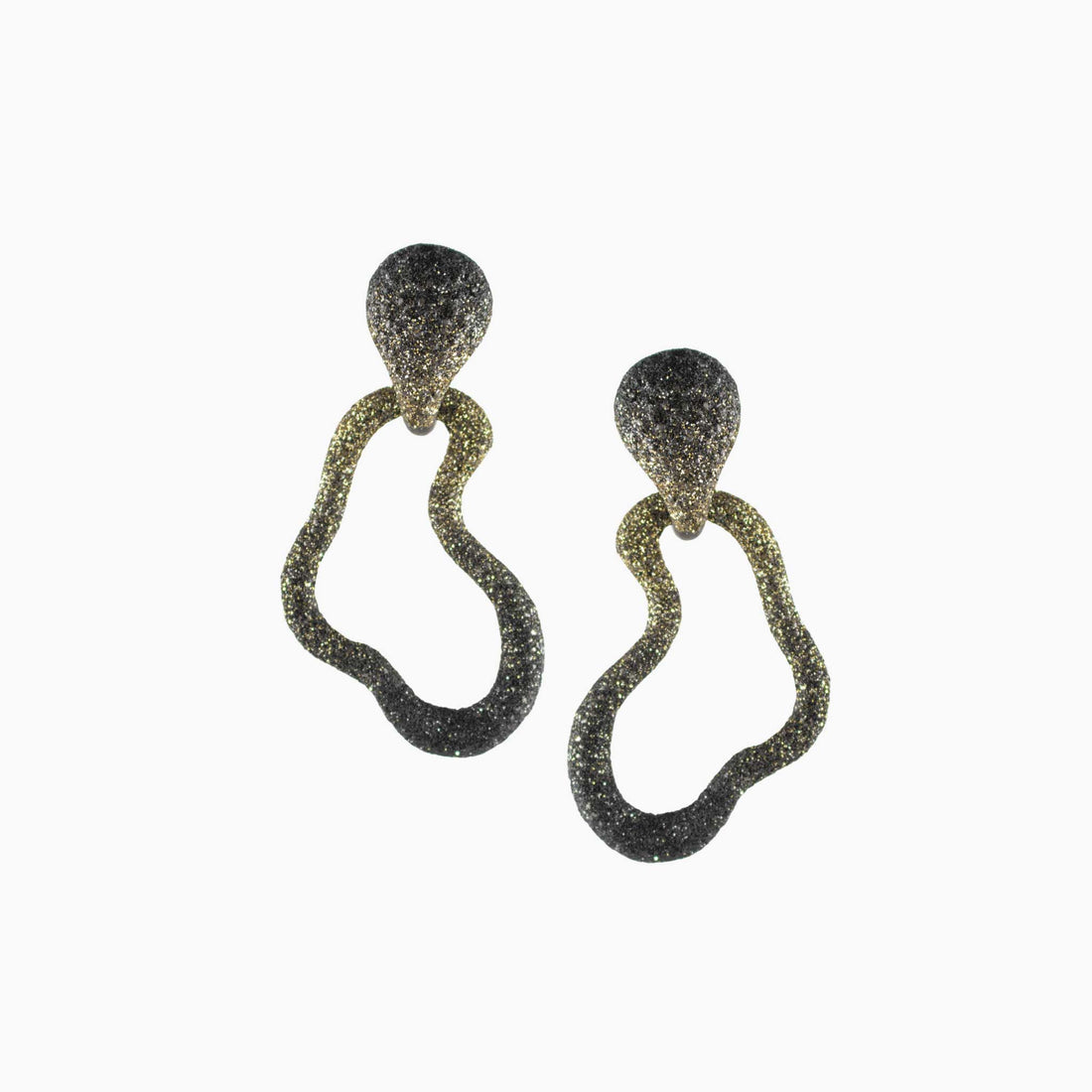 Pair of earrings with textured design on a white background