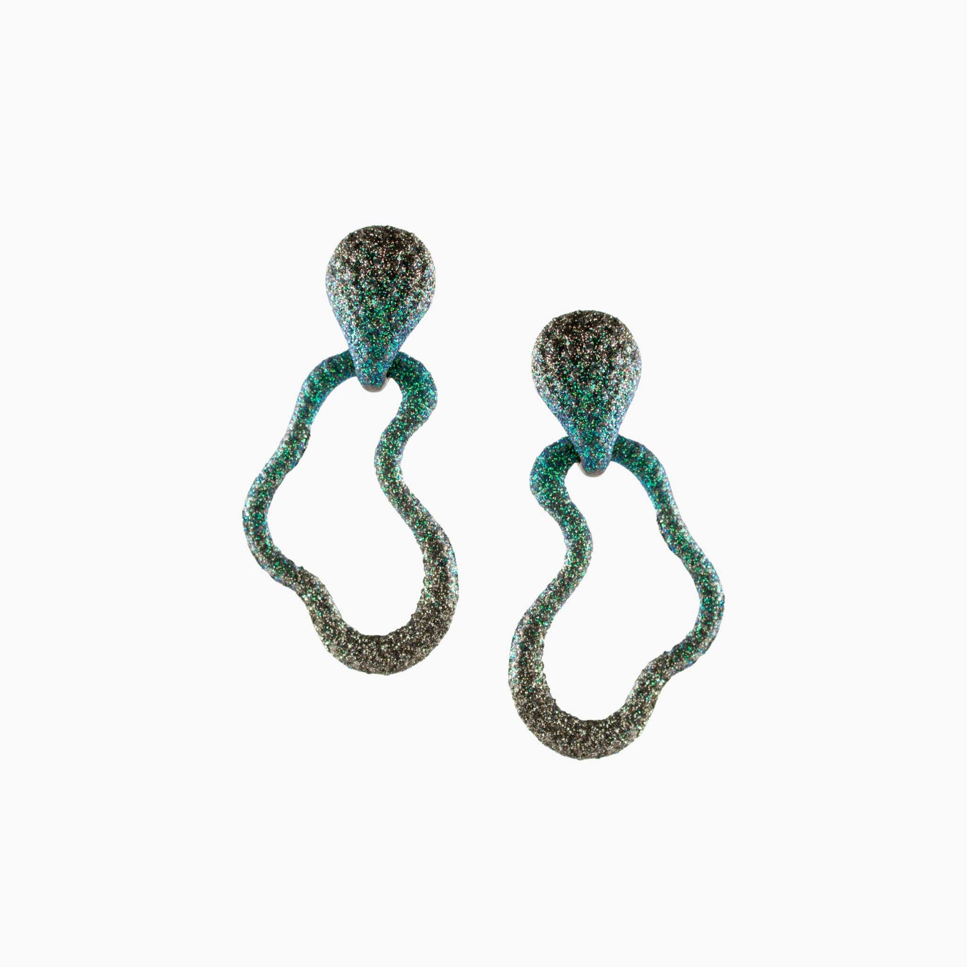 Pair of textured earrings on a white background